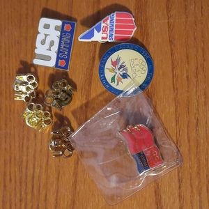 8 olympic and swimming pins